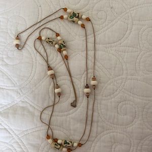 Long beaded & costume gold chain station necklace